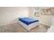 Cozy bedroom with carpet flooring and natural light from the window at 805 Baylor Dr, Deltona, FL 32725