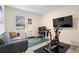 Bedroom featuring workout equipment and a desk, perfect for work and exercise at 805 Baylor Dr, Deltona, FL 32725