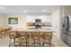 Bright eat-in kitchen with stainless appliances, granite countertops, and a large center island at 805 Baylor Dr, Deltona, FL 32725