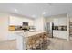Bright eat-in kitchen with stainless appliances, granite countertops, and a large center island at 805 Baylor Dr, Deltona, FL 32725