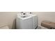Efficient laundry room equipped with modern, full-size washing machine and dryer at 805 Baylor Dr, Deltona, FL 32725
