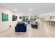 Spacious living room features large sectional sofa, tile floors and ample natural light at 805 Baylor Dr, Deltona, FL 32725