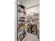 Walk-in pantry with custom shelving for optimal storage at 805 Baylor Dr, Deltona, FL 32725
