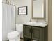 Bathroom featuring modern sink, stylish mirror, vanity, and combination shower and tub at 9124 Sw 158Th Ln, Dunnellon, FL 34432
