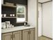 Coffee bar featuring a countertop, cabinets, a floating shelf, and a view to the front door at 9124 Sw 158Th Ln, Dunnellon, FL 34432