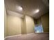 Basement with finished walls and carpet, offering potential for customization at 12113 Calaboose Ct, Orlando, FL 32828