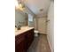 Bathroom with a walk-in shower and stylish vanity and updated fixtures at 12113 Calaboose Ct, Orlando, FL 32828