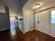 Home entryway featuring wood flooring and a double door entry at 12113 Calaboose Ct, Orlando, FL 32828