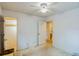 Bright bedroom features neutral carpet, closet, and ensuite bathroom access at 1606 Center St, Deland, FL 32720