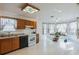 Spacious eat in kitchen features wood cabinets, laminate counters, and lots of natural light at 1606 Center St, Deland, FL 32720