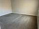 Bedroom featuring neutral walls and carpet floors at 387 Winter Nellis Cir, Winter Garden, FL 34787