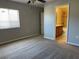 Spacious bedroom featuring neutral walls, carpet floors, and an ensuite bathroom at 387 Winter Nellis Cir, Winter Garden, FL 34787