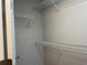 Walk-in closet with installed shelving units at 387 Winter Nellis Cir, Winter Garden, FL 34787