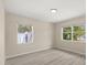 Bedroom with natural light from windows and a spacious feel at 15690 Sw 46Th Cir, Ocala, FL 34473