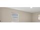 Neutral bedroom with natural light, offering a serene atmosphere at 15690 Sw 46Th Cir, Ocala, FL 34473