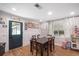Dining area featuring modern table with chairs and ample natural light and playroom area at 3333 Se 3Rd Ave, Ocala, FL 34471
