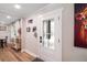 Bright entryway featuring stylish door and decor and luxury vinyl plank flooring at 3333 Se 3Rd Ave, Ocala, FL 34471