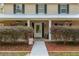 Inviting front porch with charming details and landscaped entrance at 3333 Se 3Rd Ave, Ocala, FL 34471