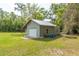 The exterior view of the garage with a light blue color at 3333 Se 3Rd Ave, Ocala, FL 34471