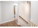 Bright hallway leads to bathroom with tiled shower at 3333 Se 3Rd Ave, Ocala, FL 34471