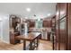 The kitchen is equipped with dark cabinets, stainless steel appliances, and wooden countertops at 3333 Se 3Rd Ave, Ocala, FL 34471