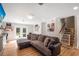 Inviting living room with comfortable sofa and French doors leading to the patio at 3333 Se 3Rd Ave, Ocala, FL 34471