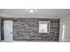 Basement featuring modern walls, base trim, and a full-sized door and window at 124 Auburn Rd, Auburndale, FL 33823