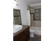 This bathroom features a modern sink and a shower-tub combo, offering both style and functionality at 124 Auburn Rd, Auburndale, FL 33823