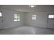 Bright and airy living room with ample natural light, perfect for comfortable living and relaxation at 124 Auburn Rd, Auburndale, FL 33823