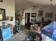 Living room needs work, items everywhere, but lots of potential at 1400 Hayward Ave, Deltona, FL 32738