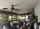 Sun room with wood features, furniture, and a ceiling fan at 1400 Hayward Ave, Deltona, FL 32738