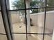 View of the back patio from inside home, showing private outdoor space at 9826 Poplar Pl, Orlando, FL 32827