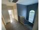 Hallway with staircase, window, and neutral decor at 9826 Poplar Pl, Orlando, FL 32827