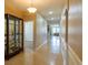 Inviting hallway leads to open living space with tiled flooring at 1720 Reflection Ln, St Cloud, FL 34771