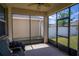 A screened in outdoor patio with an outdoor fan at 1720 Reflection Ln, St Cloud, FL 34771