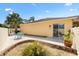 Enclosed backyard featuring mature landscaping, a patio, and tranquil views at 1139 Santa Cruz Dr, The Villages, FL 32162