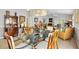 Inviting dining room with elegant decor, a large table, and natural light that creates a comfortable ambiance at 1139 Santa Cruz Dr, The Villages, FL 32162