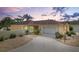 Charming single-story home with a well-manicured lawn, palm trees, and an attached two-car garage in a desirable neighborhood at 1139 Santa Cruz Dr, The Villages, FL 32162