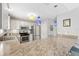 Modern kitchen featuring stainless steel appliances, custom cabinets, and a spacious countertop at 1139 Santa Cruz Dr, The Villages, FL 32162