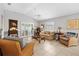 Inviting living room features bright natural light with neutral paint, comfortable seating, and tile floors at 1139 Santa Cruz Dr, The Villages, FL 32162