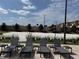 Beach volleyball court with seating available for relaxation at 3060 Rockefeller Way # 156, Kissimmee, FL 34747