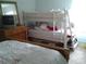 Bright bedroom features a white bunk bed, plush bedding and wood dresser at 3 Lakeside Dr, Ocala, FL 34482