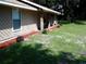 Landscaping with mulch bed and stepping stones lead up to this inviting home at 3 Lakeside Dr, Ocala, FL 34482