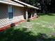 Charming home exterior featuring stone accents, well-maintained landscaping, and a welcoming walkway at 3 Lakeside Dr, Ocala, FL 34482