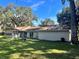 Exterior of home with a large yard at 3 Lakeside Dr, Ocala, FL 34482