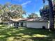 Exterior of home with a large yard at 3 Lakeside Dr, Ocala, FL 34482