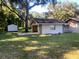 Exterior view of home and garage at 3 Lakeside Dr, Ocala, FL 34482