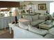 Comfortable living room area with a view into the kitchen and dining area at 3 Lakeside Dr, Ocala, FL 34482