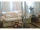 Cozy living room with a comfortable couch and natural light at 3 Lakeside Dr, Ocala, FL 34482
