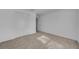 Bright bedroom with neutral carpet and a closet with double doors at 744 Osprey Roost Dr, Lakeland, FL 33801